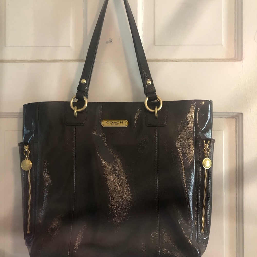 Coach brown patent leather.